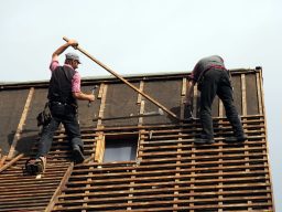 integrity roofing group crew working on framing